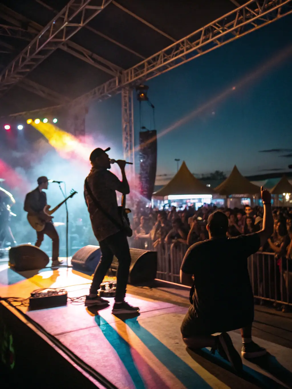 A vibrant image of artists performing at a festival supported by ASSOCIATION AURAMUSIC PROD, capturing the excitement and cultural exchange.